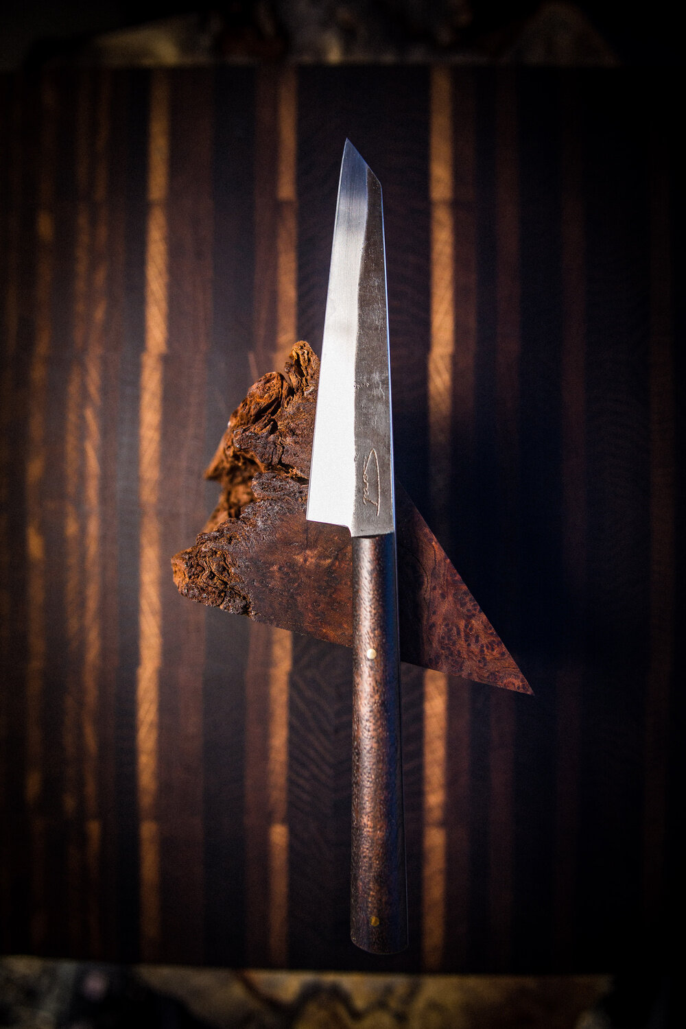 close up of Seral Wood and Steel knife